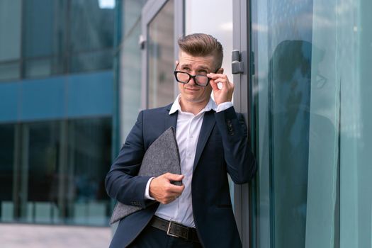 Business. Businessman Glasses With Folder Standing Office Building Entrance Handsome Caucasian Male Business Person Portrait City Corporative Building Background Successful Young Adult Manager