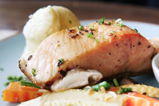 tasty salmon and vegetable on plate ,