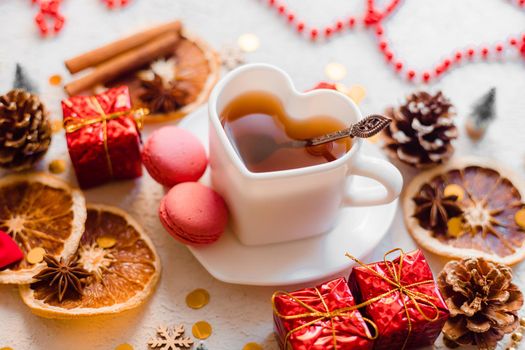 New Year 's tea on a white background . Glitter and white background. Holiday. Holiday decorations. Hot tea . The layout is a festive tea party. Christmas