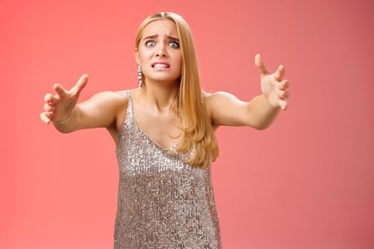 Obsessed ex-girlfriend widen eyes crazy clench teeth stretch hands forward wanna hold tight forever together standing crazy weird red background in silver dress clingy girl want hugs, cuddles.