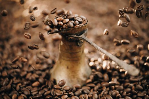 Turkish Coffee Pot and Coffee beans. Coffee beans close up.