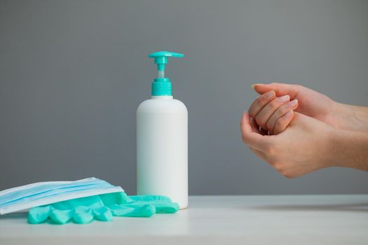 Female using alcohol gel as hand sanitizer for prevent the spread of germs and bacteria and avoid infections corona virus. Hygiene concept