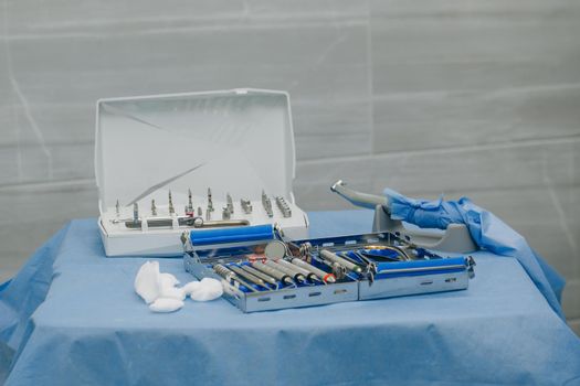 Surgical kit of instruments used in dental implantology. Dental implantation surgical set. Dentist orthopedist tools.