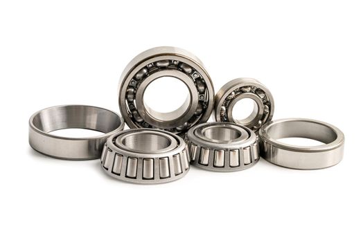 Ball bearing stainless metal roller for machine industrial, angular contact isolated on white background with clipping path.