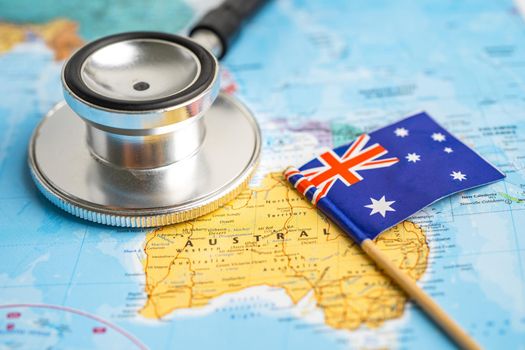 Bangkok, Thailand - June 1, 2021, Stethoscope on Australia world globe map background.