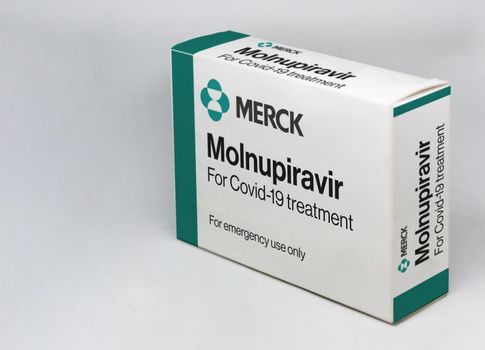 New York, USA, October 2021: Merck Covid-19 Molnupiravir treatment box isolated on a white background. Health and prevention.