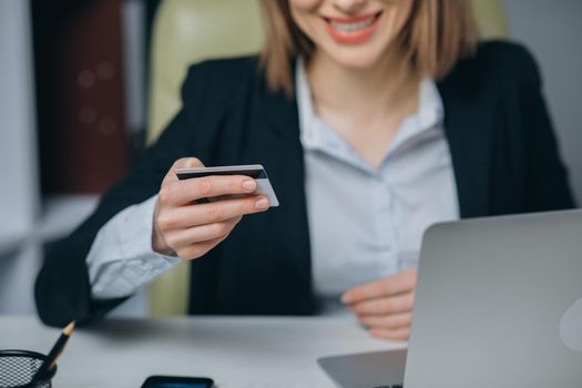 Online shopping, E-commerce, Sale, Consumerism, Electronic Payment, Technology Concept. Woman Using Laptop Device, Holding Credit Card, Buying Goods or Ordering Online