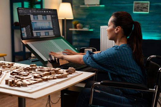 Digital engineer working on virtual blueprint building plan sketch on modern touchpad screen monitor computer display. Woman drawing futuristic concept renovation property project