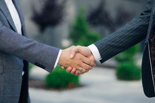 Close up Hands Business People Shaking Successful Corporate Partnership Deal Welcoming Opportunity at Business Center Background Agreement Professional Greeting Meeting Colleagues Partners.