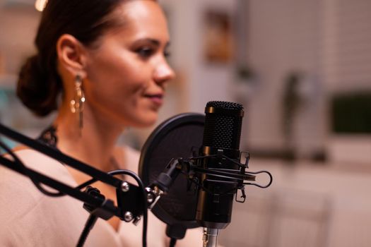 Vlogger woman recording video for her blog in home studio. On-air online production internet broadcast show host streaming live content, recording digital social media communication