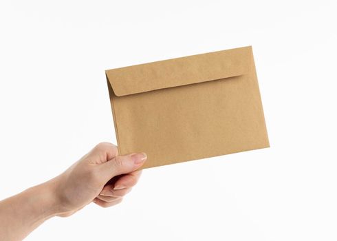 hand holding envelope. High resolution photo