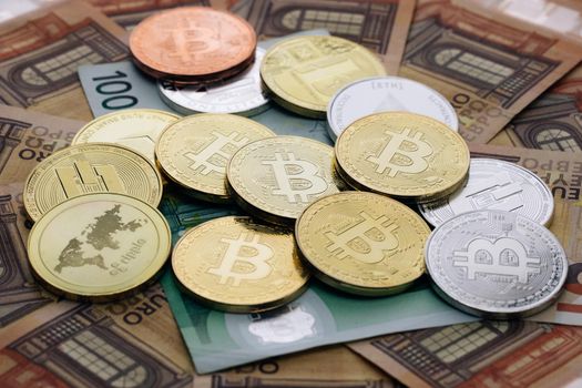 BitCoin BTC, Ethereum ETH and Litecoin LTC coins. Digital coin money on euro banknotes. Crypto currency, quotes online concept, stock exchange, exchange market