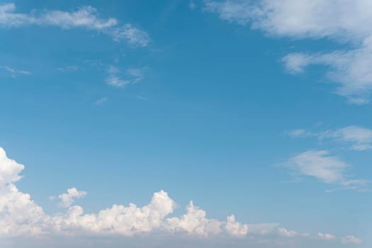 blue sky fluffy clouds. High resolution photo