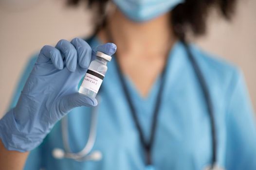 female doctor preparing vaccine patient. High resolution photo