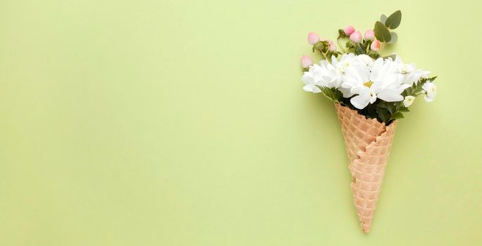 ice cream cone with flowers. High resolution photo