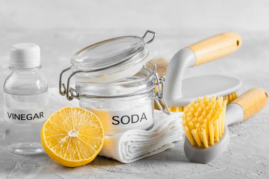 front view eco friendly cleaning brushes lemon baking soda. High resolution photo