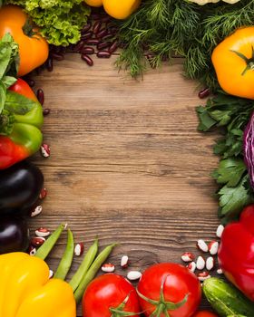 top view vegetables assortment with wooden background. High resolution photo