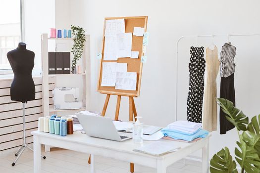 fashion atelier idea board desk clothing line. High resolution photo