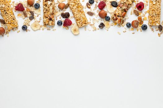 top view breakfast cereal bars with fruits copy space. High resolution photo