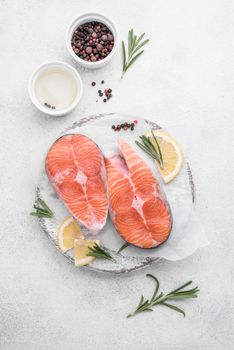 slices fresh salmon slices white plate. High resolution photo