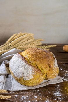 Homemade crispy turmeric bread, on a kitchen countertop.