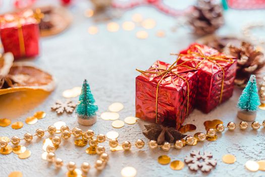 New Year's gift layout on a white background. An article about choosing a gift for a holiday. Red gift wrapping. New Year and Christmas