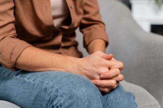 woman holding hands together. High resolution photo