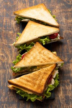 high angle triangle sandwiches with tomatoes. High resolution photo