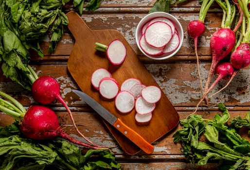 top view radishes with knife. High resolution photo