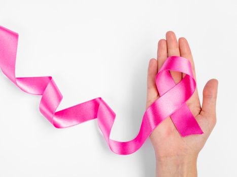 palm with pink ribbon. High resolution photo