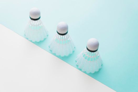 three white shuttlecock dual background. High resolution photo