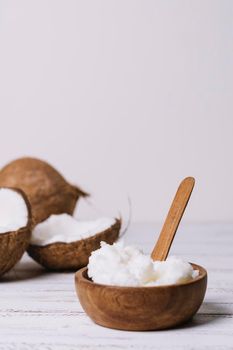 vertical shot bowl with coconut oil. High resolution photo