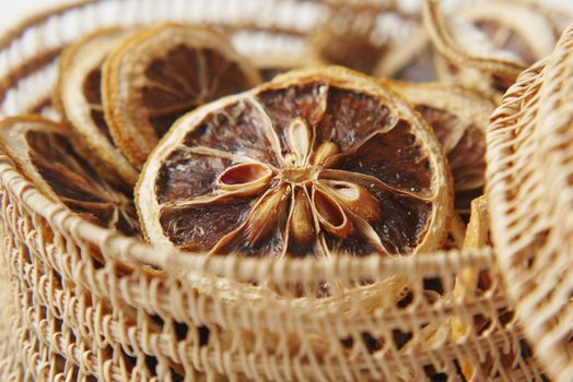 close up of dry lemon in a bow on table .