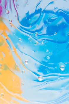 liquid effect blue yellow painted background. High resolution photo