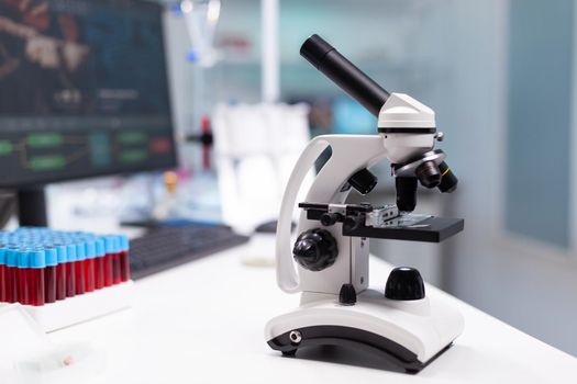 Biochemistry medical microscope ready for biological dna sample clinical investigation in pharmaceutical hospital laboratory. Microbiology virus healthcare treatment experiment