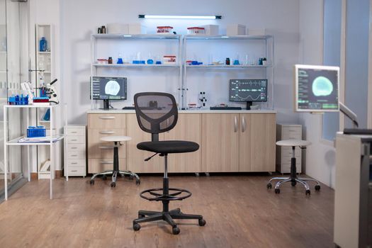 Empty laboratory modernly equipped with nobody in it, prepared for neurological innovation using high tech and microbiology tools for scientific research. Medical clinic for examining brain functions.