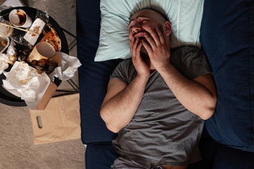 Scared, traumatized, vulnerable, shocked man unwilling to stop crying because health diagnostic threw him in depression state feeling ill, alone and frustrated suffering from mental disorder