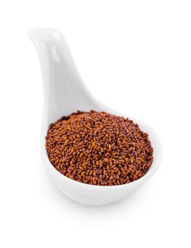 Seeds of Lepidium sativum in wooden isolated on white background, Save clipping path.