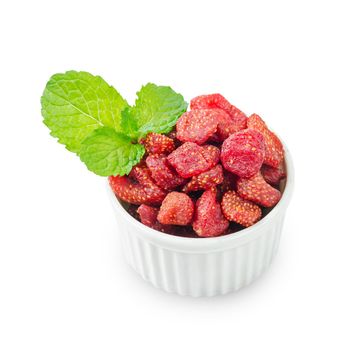 Dried sweet strawberries with green leaf in with bowl isolated on white background, save clipping path.