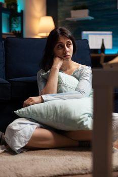 Desperate , frustrated, vulnerable woman lost in break up thoughts thinking of loneliness having anxiety, mental problems, bipolar disorder looking in distance suffer from major depression