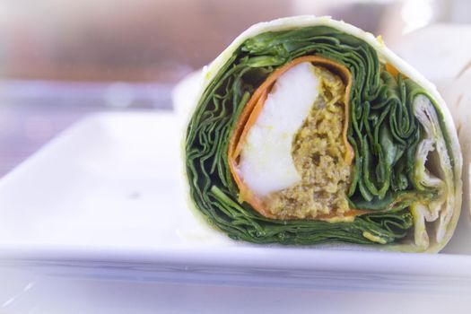 Vegetable pancake roll with spinach. No people