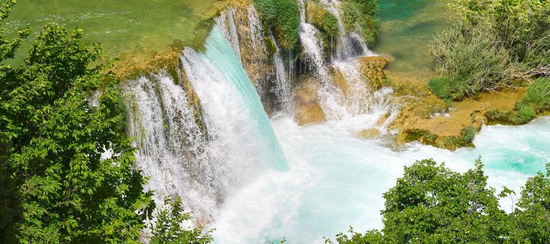 Mountainous beautiful waterfalls formed by the melting of glaciers due to global warming. Beautiful Waterfalls at Krka National Park in Croatia.