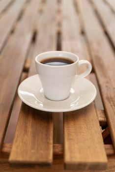 minimalistic coffee cup wooden table. High resolution photo