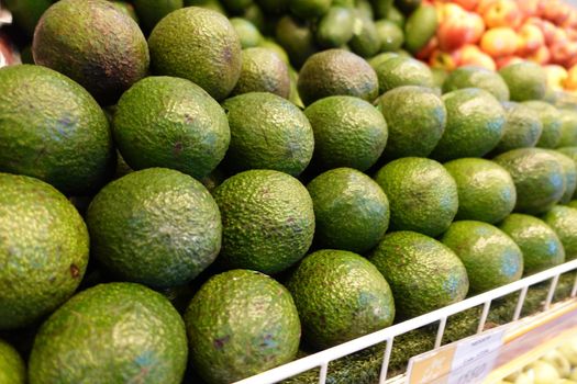 many avocado display for sale at local store .