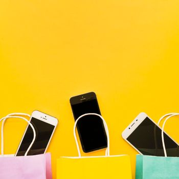 smartphones shopping bags. High resolution photo