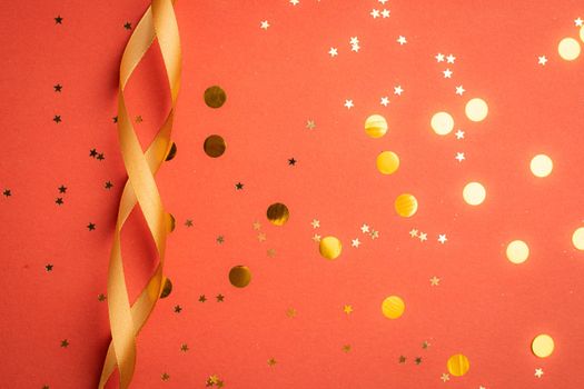 New Year 's layout on a red background with balloons . New Year and Christmas copy space. . Festive decoration. Christmas balls