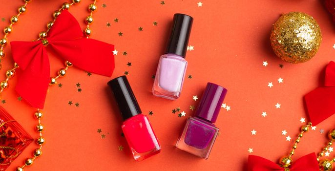 Nail polish in a New Year 's layout . New Year's gift cosmetics. The layout of the new year. A holiday gift.