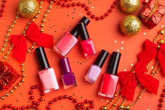 Nail polish in a New Year 's layout . New Year's gift cosmetics. The layout of the new year. A holiday gift.