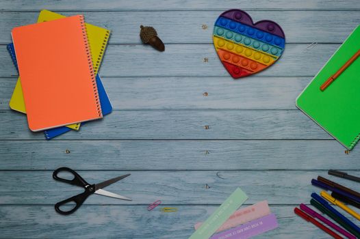 Beautiful bright layout of school subjects top view flatlay