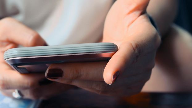 Close up image of Woman Using a Smart Phone